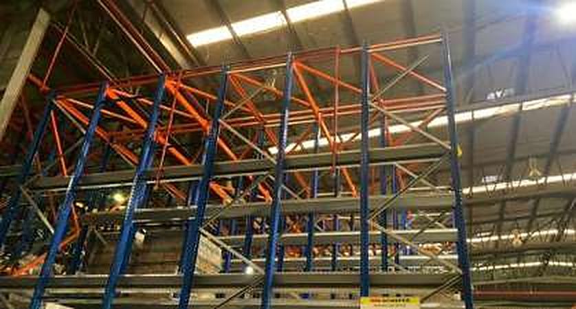 Sprinkler piping on warehouse steel racks